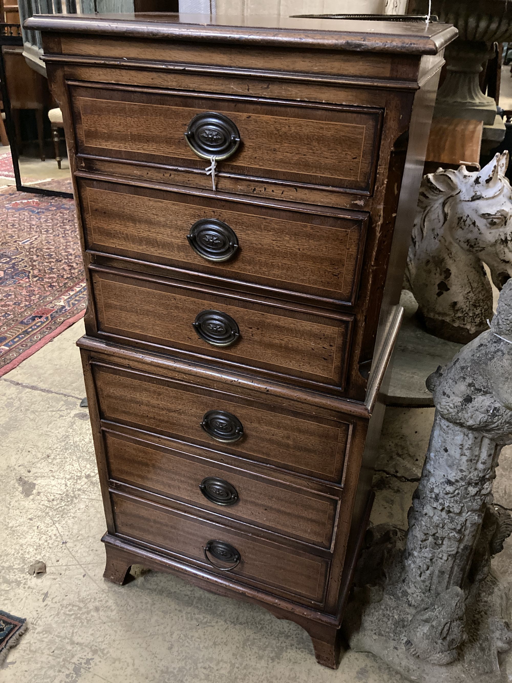 A small banded and inlaid mahogany tall chest of six long drawers, width 52cm depth 37cm height 115cm